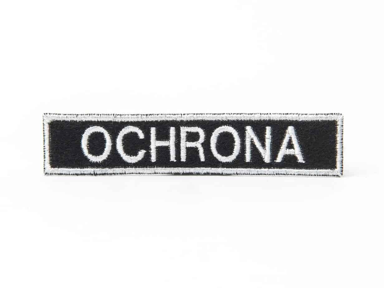 KIRYS-naszywka-ochrona-mala-biala.jpg Mała naszywka "Ochrona" - obrazek 1